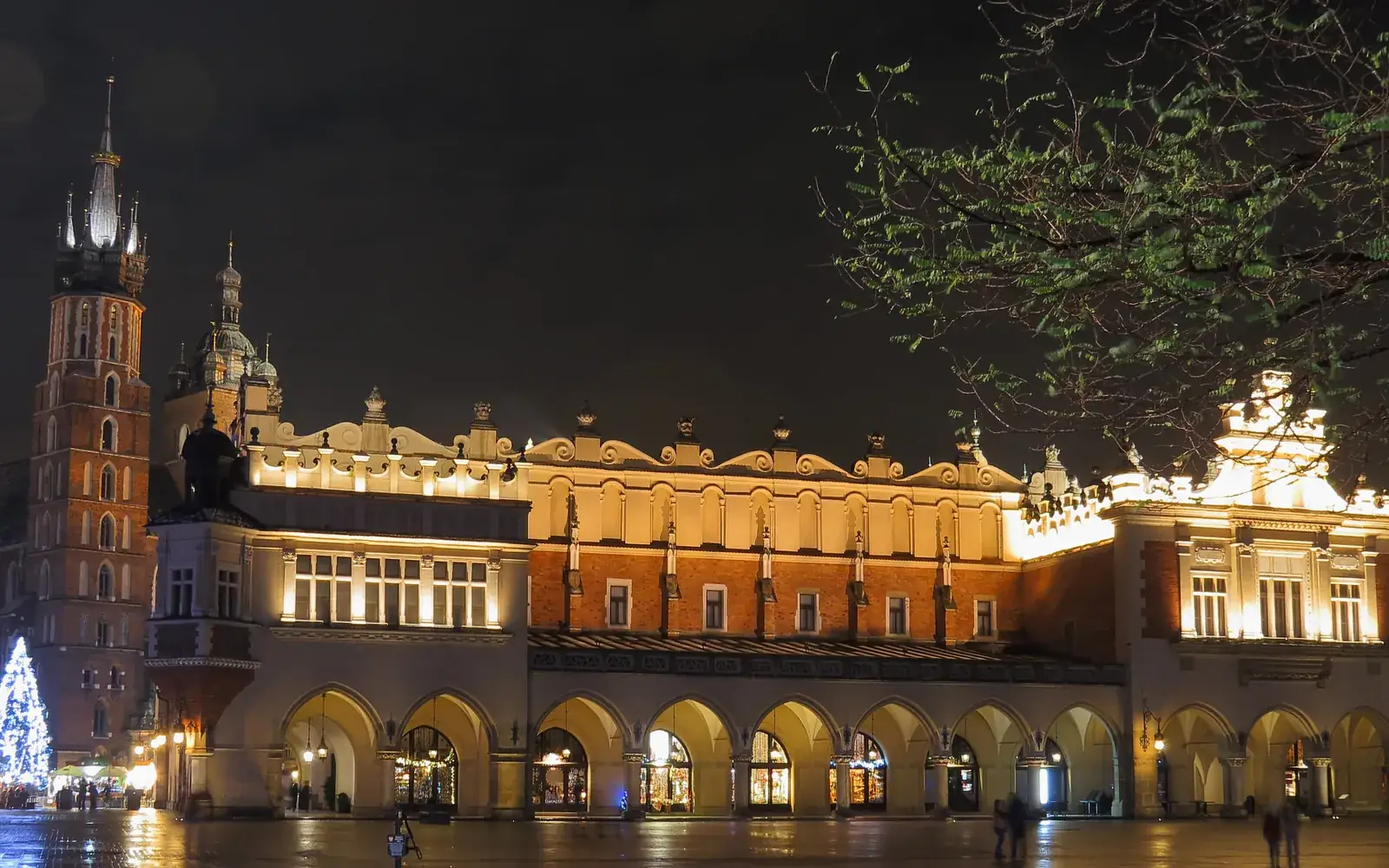 An ordinary evening walk through Kraków's Main Square after rain. Not a special day, and still worth one photo.