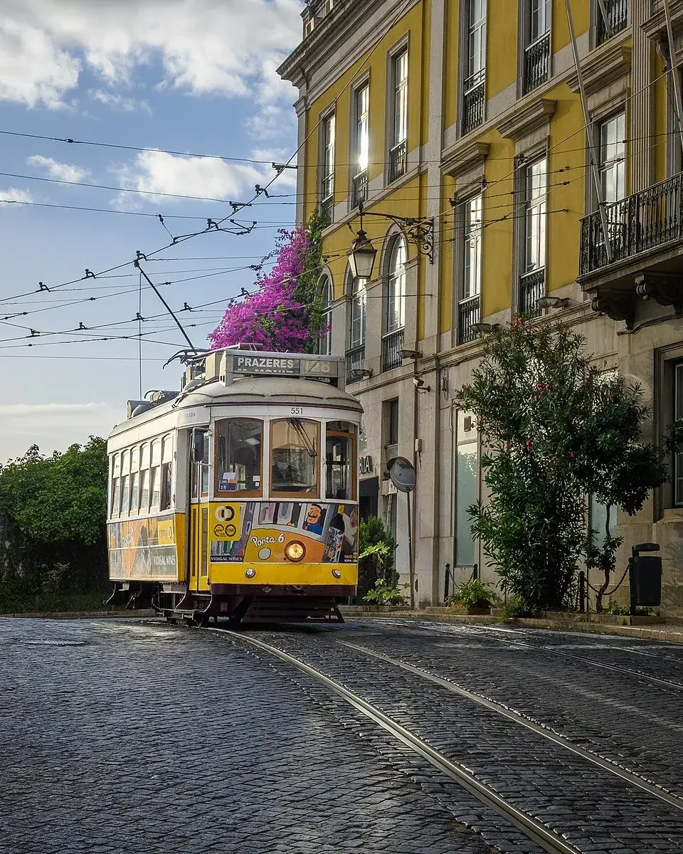 A tram ride in Lisbon. The paper ticket from it is worth more than a fridge magnet.